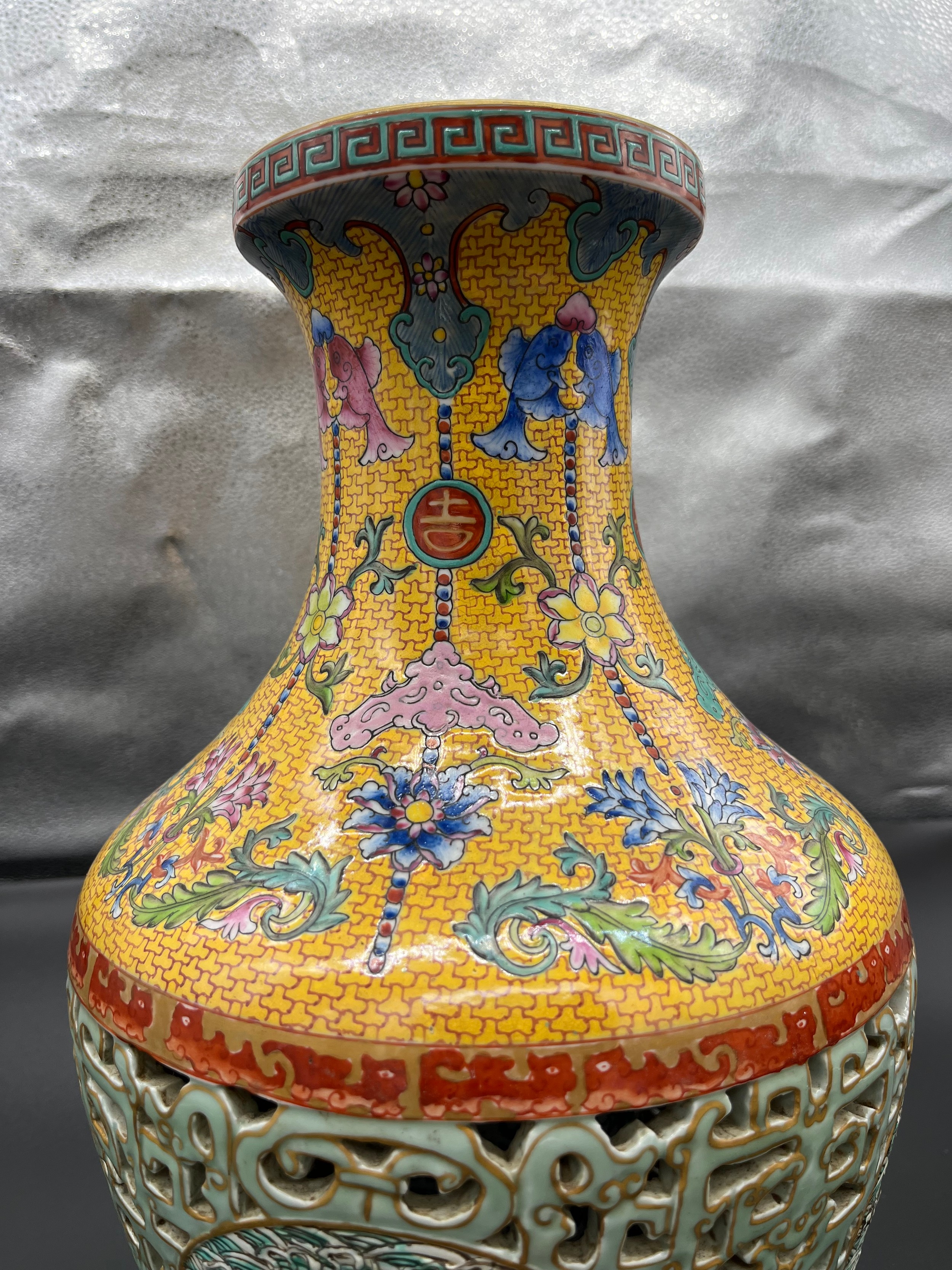 A Chinese Qianlong era marked vase. Yellow ground and pierced blue ground, Four panels depicting - Image 2 of 18