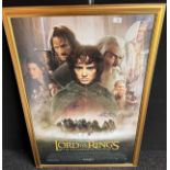 A Vintage framed Lord of the Rings poster signed by Cate Blanchett, Elijah Wood, Sean Austin, Ian