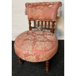 19th century chair, the cushioned back and central wooden spindle support above a cushioned circular