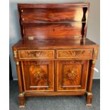 Regency mahogany cabinet, the top with single enclosed shelf, the base with two drawers and two