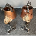 Two arts and crafts copper ceiling lights together with a pair of art nouveau cast iron and copper