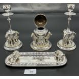 Ornate four piece silver plate writing desk set, consists- a pair of candle sticks, ink well pot and