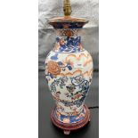A Chinese hand painted floral and figure design table lamp. [54cm high]