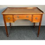 Antique desk, the rectangular top with gallery edging, above a centre drawers and flanked by two