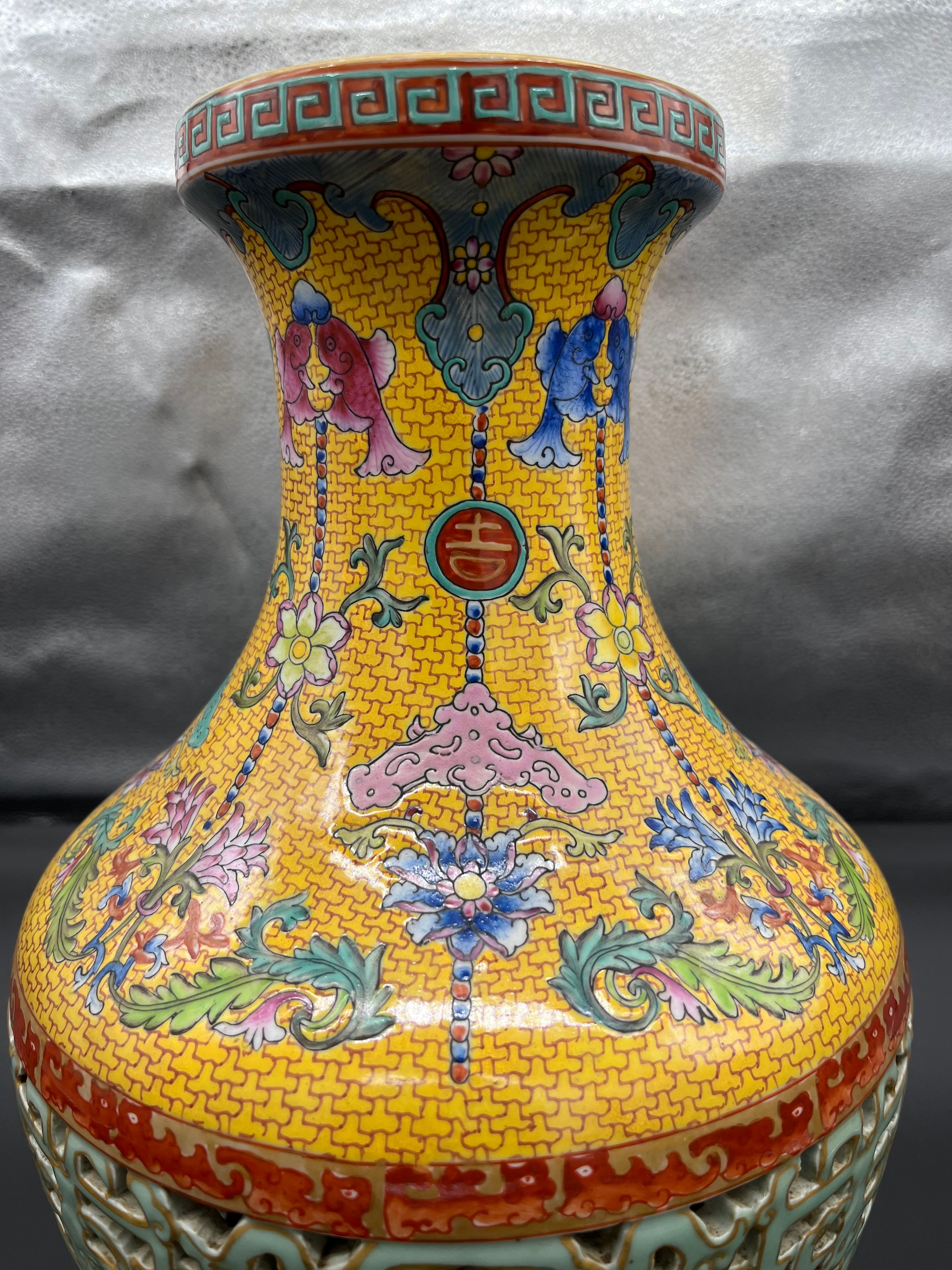 A Chinese Qianlong era marked vase. Yellow ground and pierced blue ground, Four panels depicting - Image 6 of 18