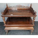 Antique rosewood unit, the pierced gallery top above two rectangular surfaces and under drawer,
