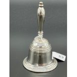 A London silver Jubilee marked hand bell. [12cm high] [182.44grams]