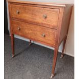 Antique two Drawer chest, supported on square tapered legs and castors