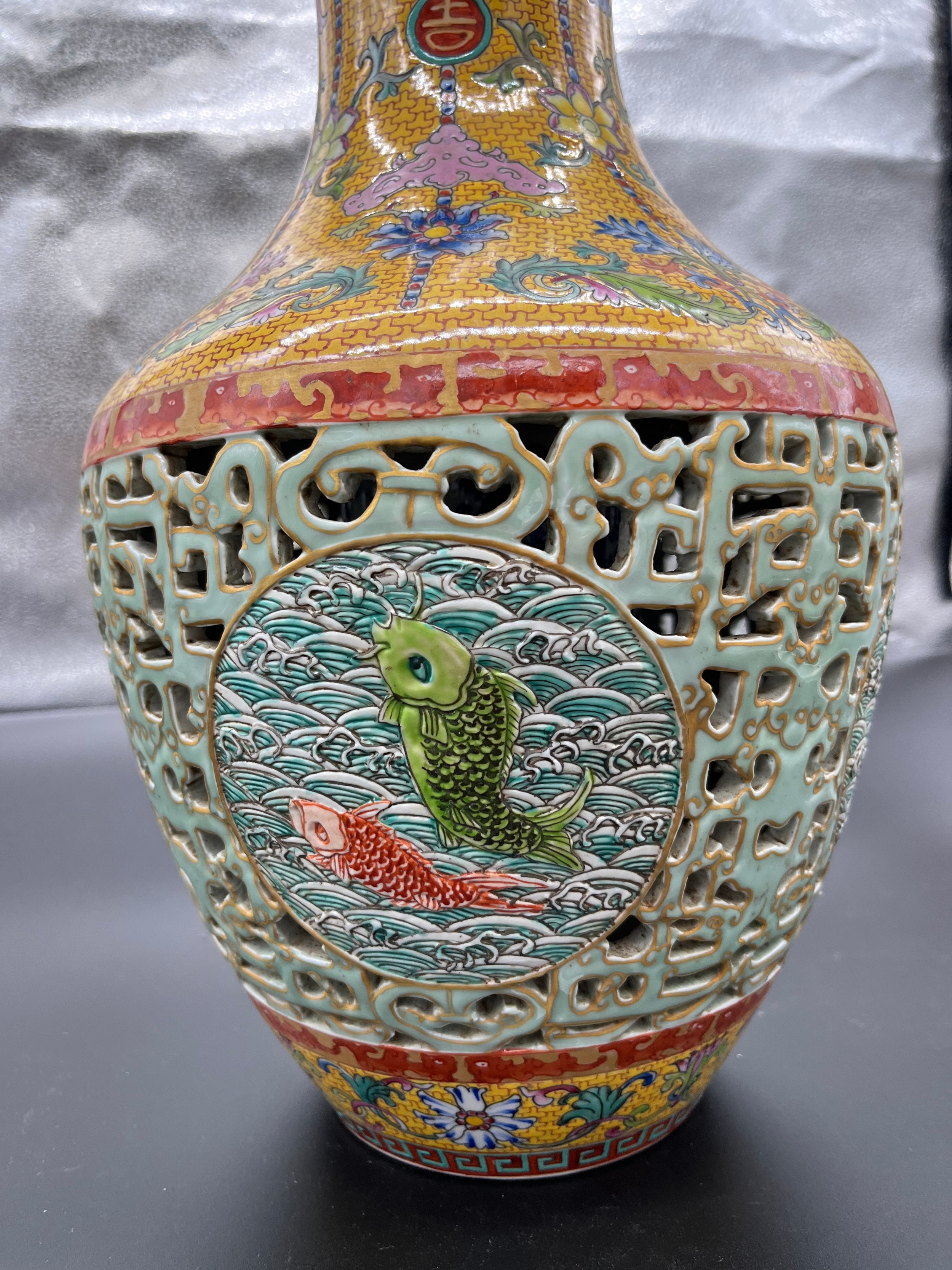 A Chinese Qianlong era marked vase. Yellow ground and pierced blue ground, Four panels depicting - Image 3 of 18