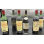 Six Bottlings of Wine. Three bottles of 1985 Chateau Saint- Laurent Bordeaux, 1982 Domaine D'