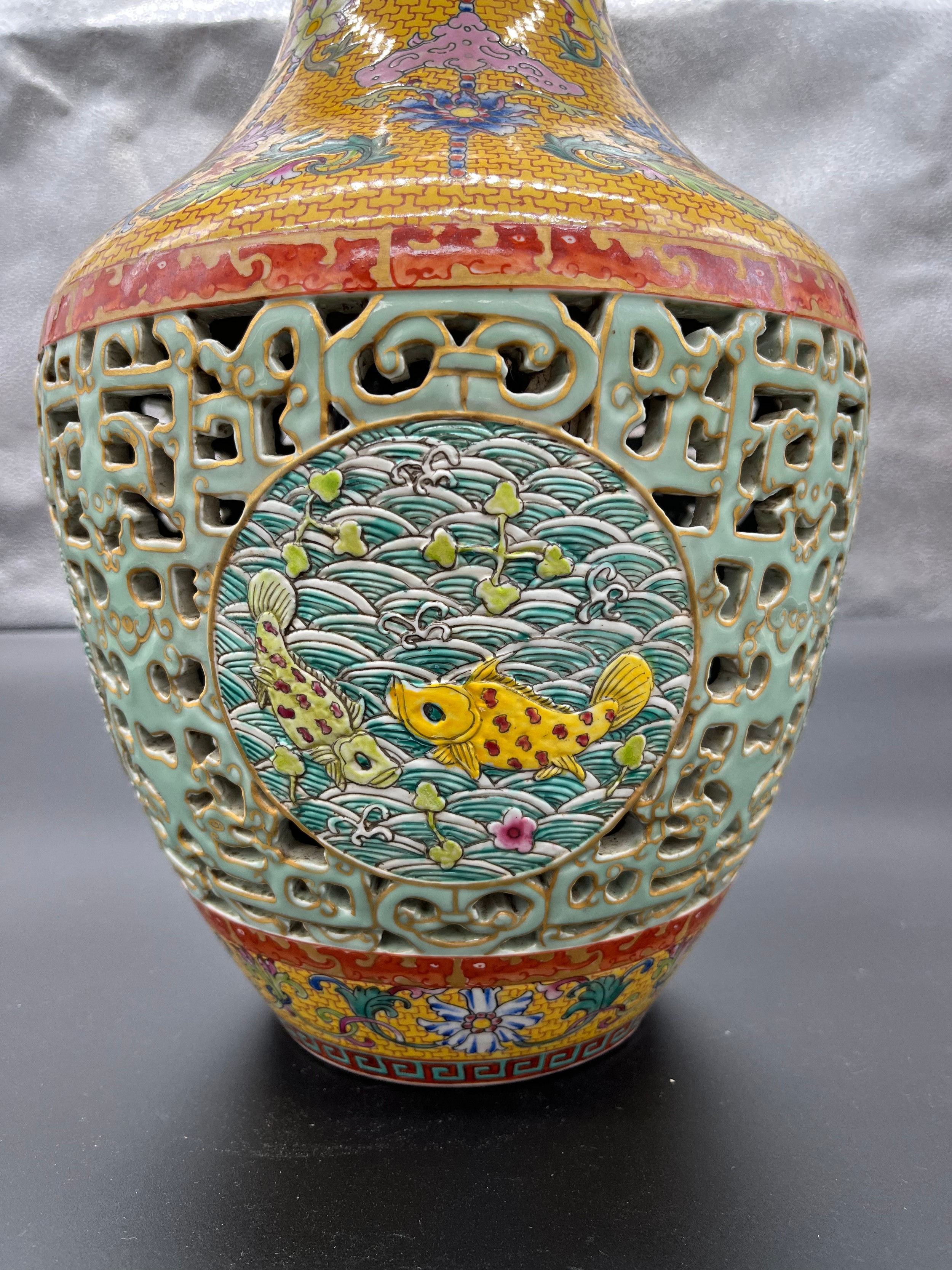 A Chinese Qianlong era marked vase. Yellow ground and pierced blue ground, Four panels depicting - Image 7 of 18
