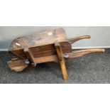 Small wooden wheel barrow [display piece]
