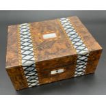 Antique burr walnut sewing box designed with mother of pearl inlay and marquetry work. Contains