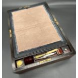 Antique writing slope travel box, containing various trinkets, white metal and agate pill box,