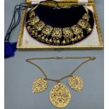 Two ornate Indian 24ct yellow gold dress/ ceremonial necklaces, decorated with pearls, ruby and