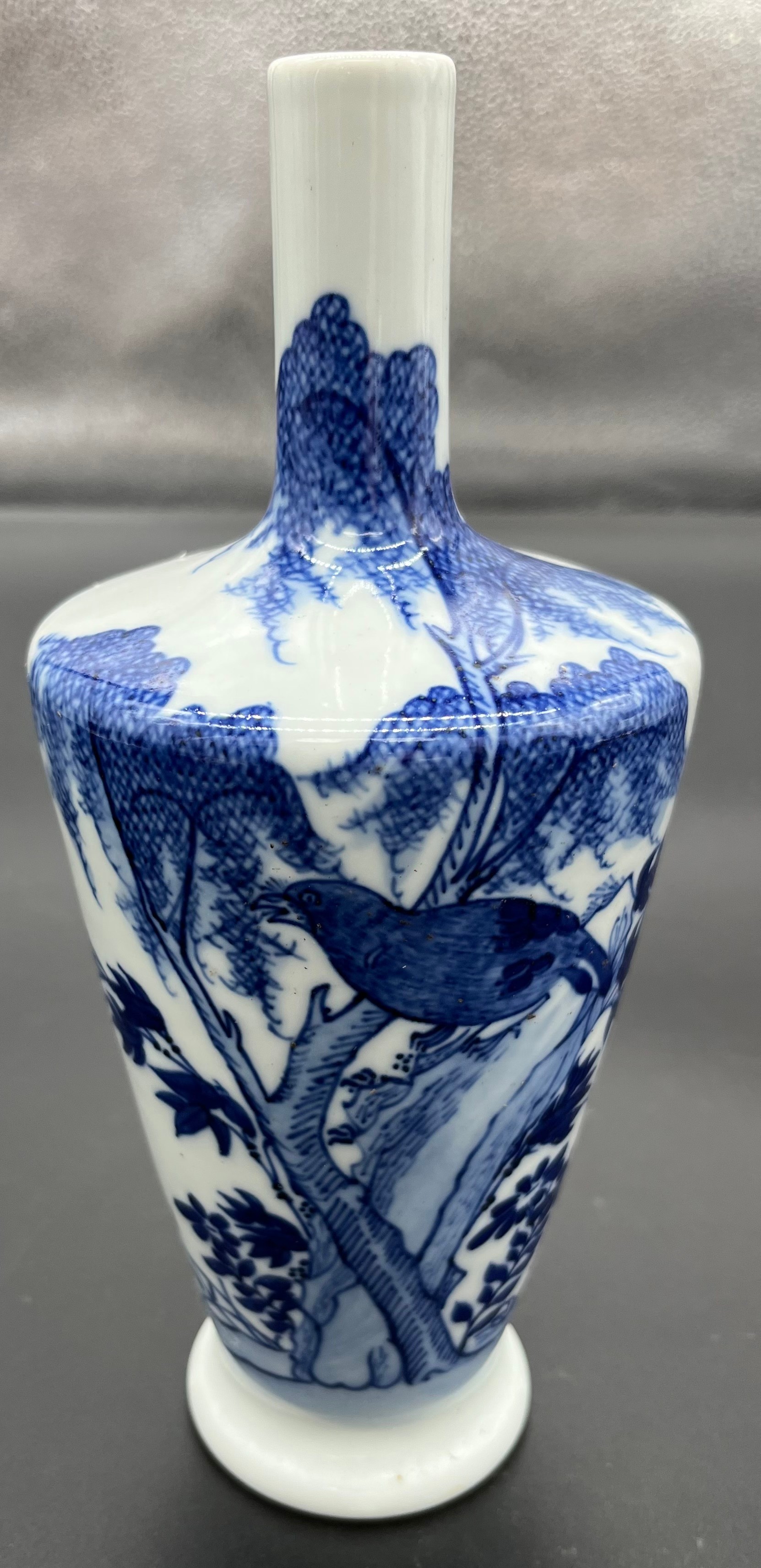 A Chinese blue and white vase, Da Qing Kangxi Nian Zhi era marked. [23cm high]