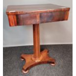 19th century rosewood table, the rectangular top above a frieze drawer, raised on a tapered column