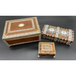 Three antique boxes made from wood, faux ivory and tortoise shell. Includes games box containing