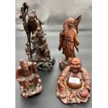 Four hand carved antique root wood Chinese figure carvings. [Tallest 29cm high]