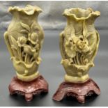 A Pair of Chinese soapstone hand carved vases, detailed with raised relief flowers. [25cm high]