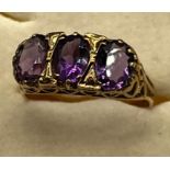 Ladies 9ct yellow gold and three Amethyst stone ring. [Ring size P] [2.89Grams]