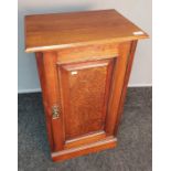 Arts and crafts oak side cabinet, the rectangular top above a panel door leading to interior