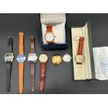 ROTARY – A gentleman's gilt cased wristwatch, Cream dial, sweep second hand and date, leather strap,
