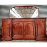 19th century mahogany sideboard, the mirror with shaped moulded frame above a pull-out narrow centre
