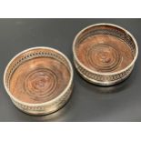 A Pair of London silver and wooden bottle cooler dishes, Produced by Hamilton & Inches. [4cm high,