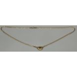 Ladies 9ct yellow gold curb chain attached to a 9ct gold and single blue quartz stone pendant. [5.