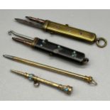 Four antique pencils, One possibly gold- detailed with turquoise stone design, Two have additional