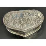 A Birmingham silver ornately decorated lidded preserve dish. Lid details a man playing the