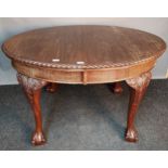 Victorian mahogany wind-out table, the oval shaped top with carved moulded edging above a frieze,