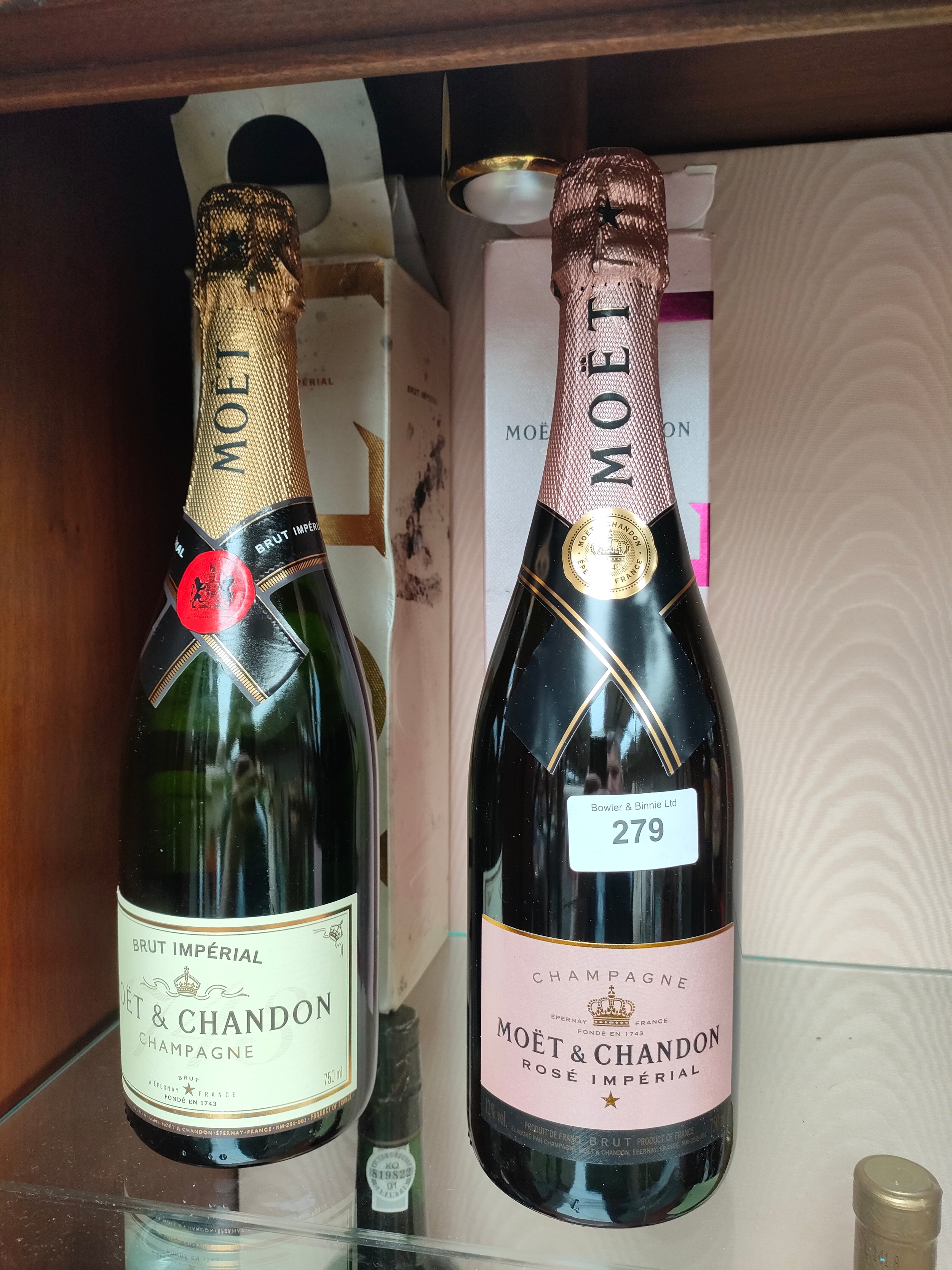 2 Bottles of Moet Chandon champagne.
