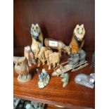 Selection of carved wooden items includes Black forest hand carved bears on sledge etc.