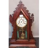 Antique American Ginger bread clock, Comes with key and pendulum. In a working condition. [57cm