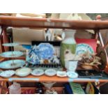 Shelf of collectables includes retro vase , drift wood style fish sculpture and cake stand etc.