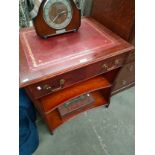 Reproduction leather topped desk.