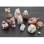 Collection of Royal Crown Derby porcelain animal figurines, some with gold/silver button (10)