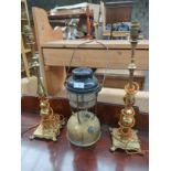 Old storm lamp together with pair of antique brass table lamps [Will not post]