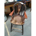 Antique style child's high chair by Pegasus.