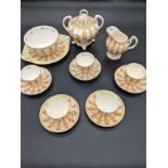 Fourteen piece antique porcelain tea set in a gilt/gold design