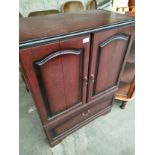 Mahogany TV cabinet.