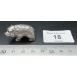 A well cast heavy silver figure of a brown bear