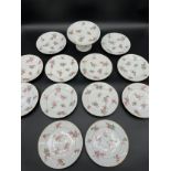 A set of twelve 19th century English tea plates and tazza. Showing a pink flower design. [Some as