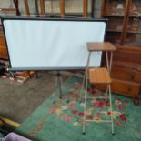 Projector stand together with screen .
