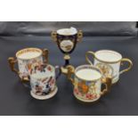 Collection of double handled cups to include Paragon, Mason's and Coalport