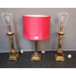 Three various Corinthian column style table lamps. [Will not post]