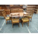 Stag Dinning Room Table with four chairs and 2 carvers.