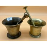 Two heavy antique bronze pestle and mortars.